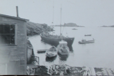 The skiff Mary Maureena pulling the schooner Marie Stone away from Paddy Hann’s wharf in August 1957.&amp;nbsp; To the left is Din Pat Walsh’s skiff, Sheena and to the right is Paddy Jim’s passenger boat “Guerney”.